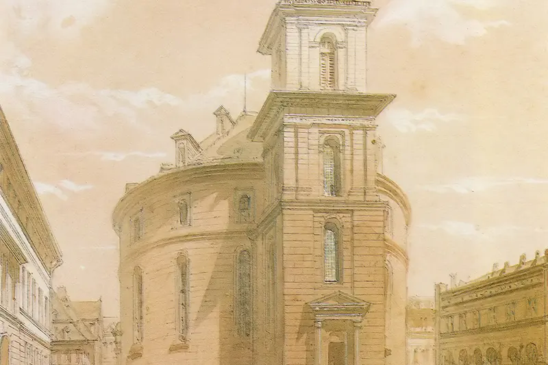 {'de': 'Runde Kirche mit hohem Turm zwischen Stadthäusern in hellen Aquarelltönen, Frankfurt Paulskirche 1848, Jean Nicolas Ventadour, 1848.'}