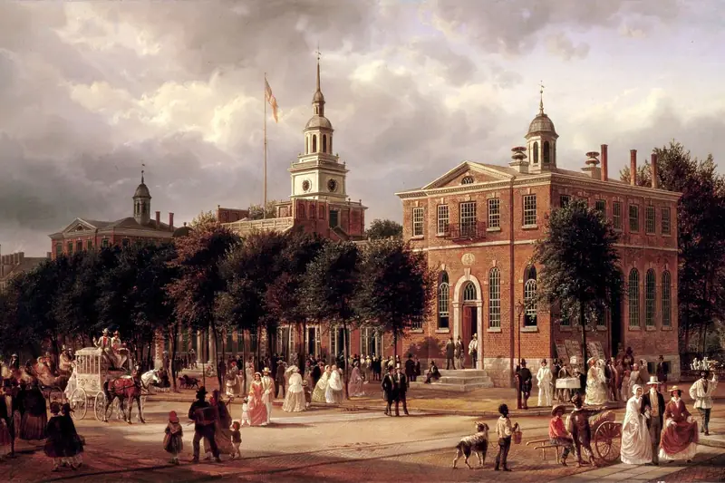 {'en': 'People in wide dresses and a horse carriage pass a brick hall with a clock tower, Independence Hall in Philadelphia, Ferdinand Richardt, 1858.'}