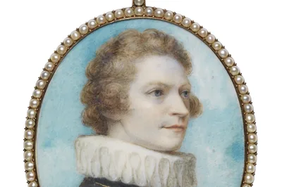A curly haired young man in a white pleated ruff, painted in an oval frame of pearls, Self-Portrait in Elizabethan Costume, Richard Cosway, 1790.