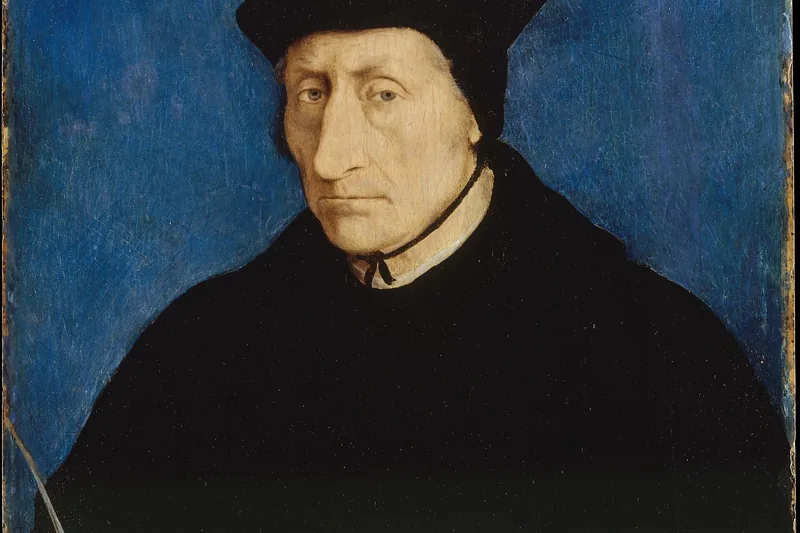 {'fr': "Homme d'âge mûr en toque et robe noires, de trois quarts sur un fond bleu uni, Guillaume Budé, Jean Clouet, 1536."}